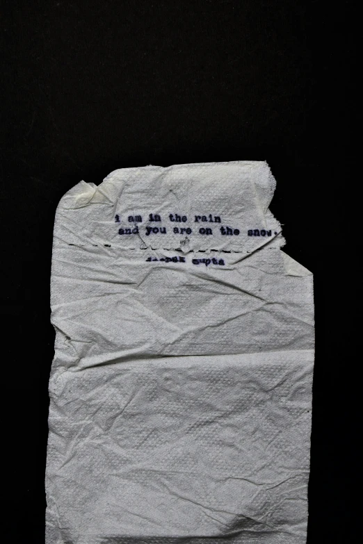 a piece of torn paper with a message on it