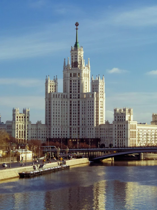 a river that is next to a large building