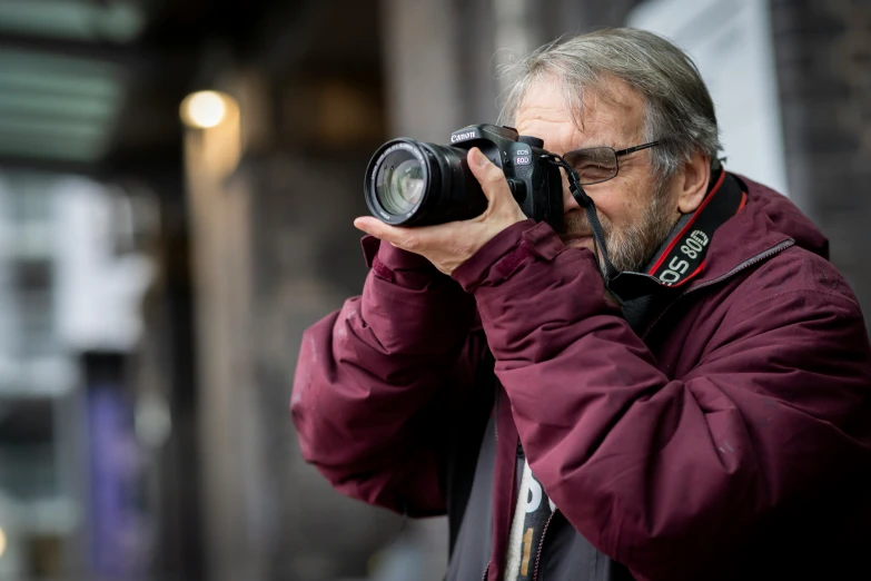 a man is taking a picture with his camera