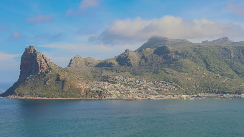 the view over an island and sea in a big body of water