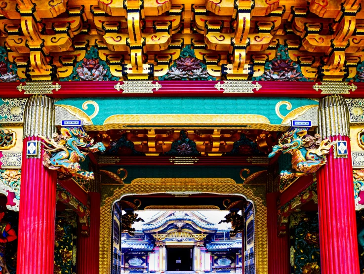 colorful, elaborate chinese art is framed by columns