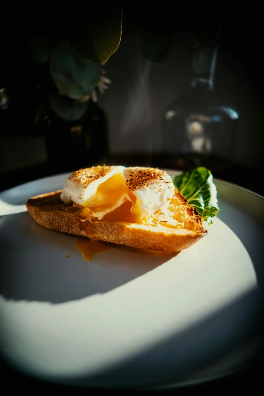 a close up of a plate of food with an egg on it