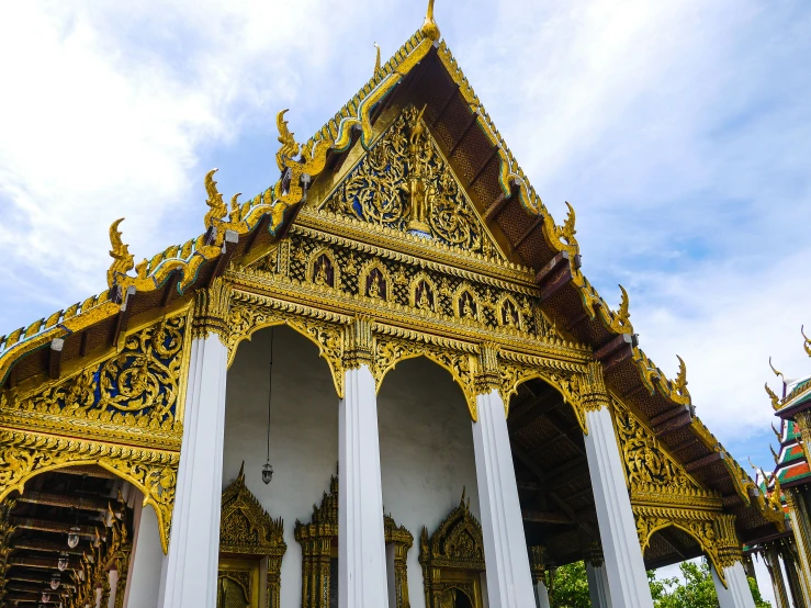 ornate columns and architecture in a small buddhist temple