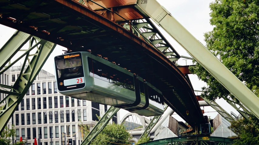 a train is going down the elevated track