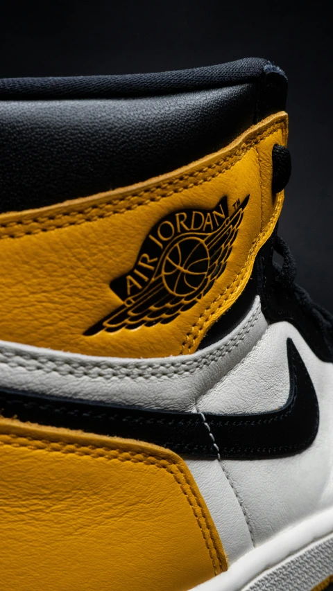 the air jordan shoe is made with white and yellow