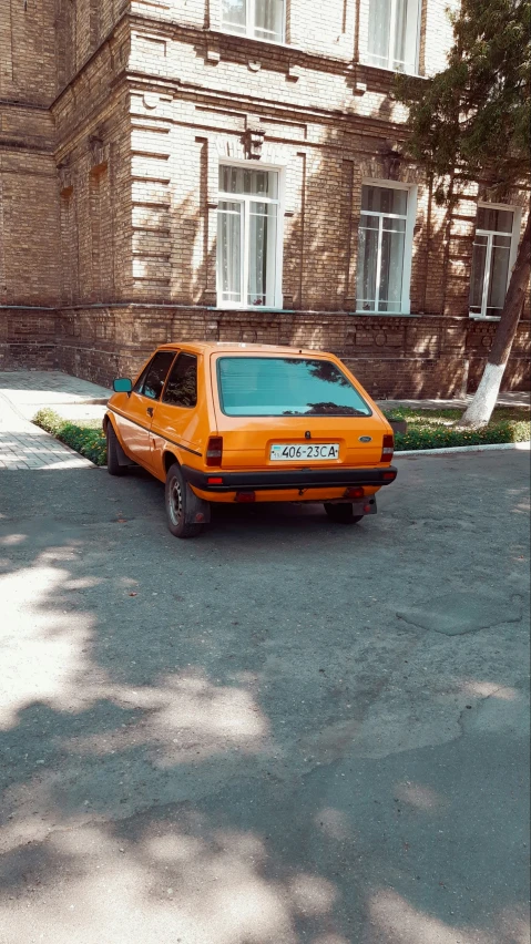 a car parked in front of an old building