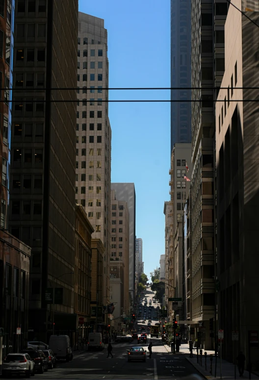 an urban city street with buildings lining it