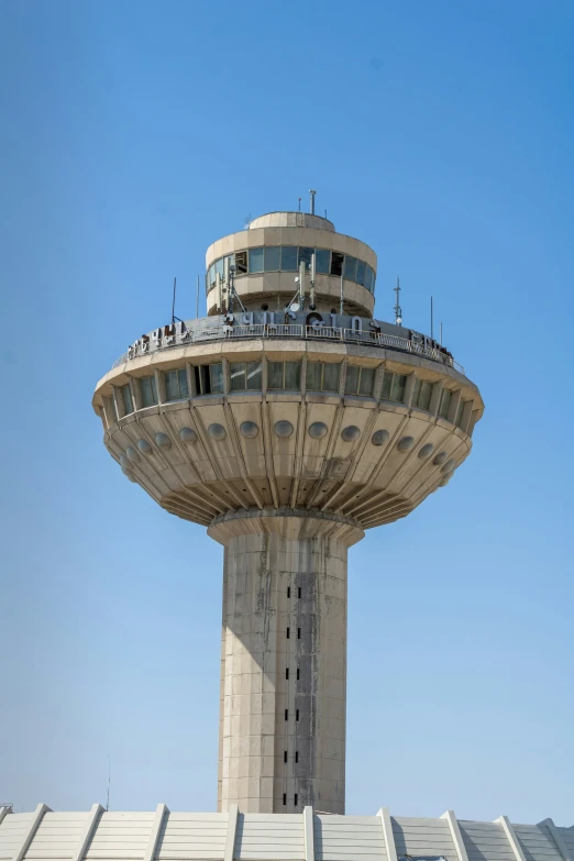 a view of a tall tower in a desert