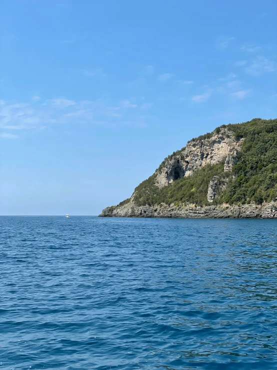 a rock outcropping from the ocean