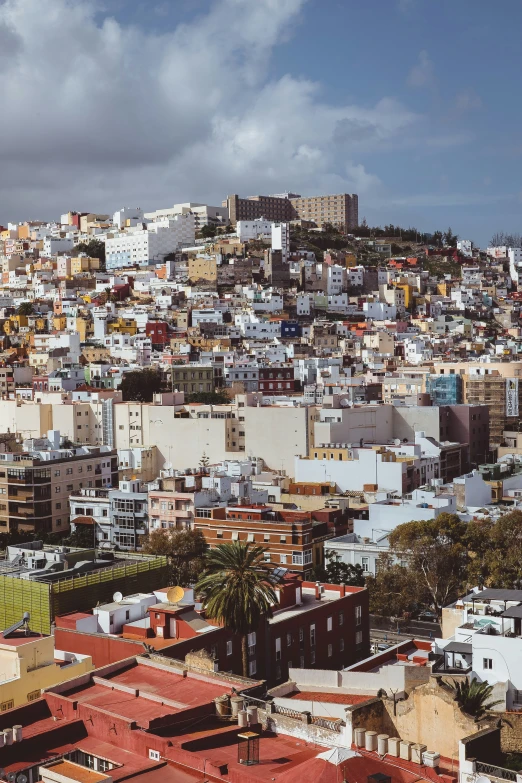 the view of a city on top of the hill