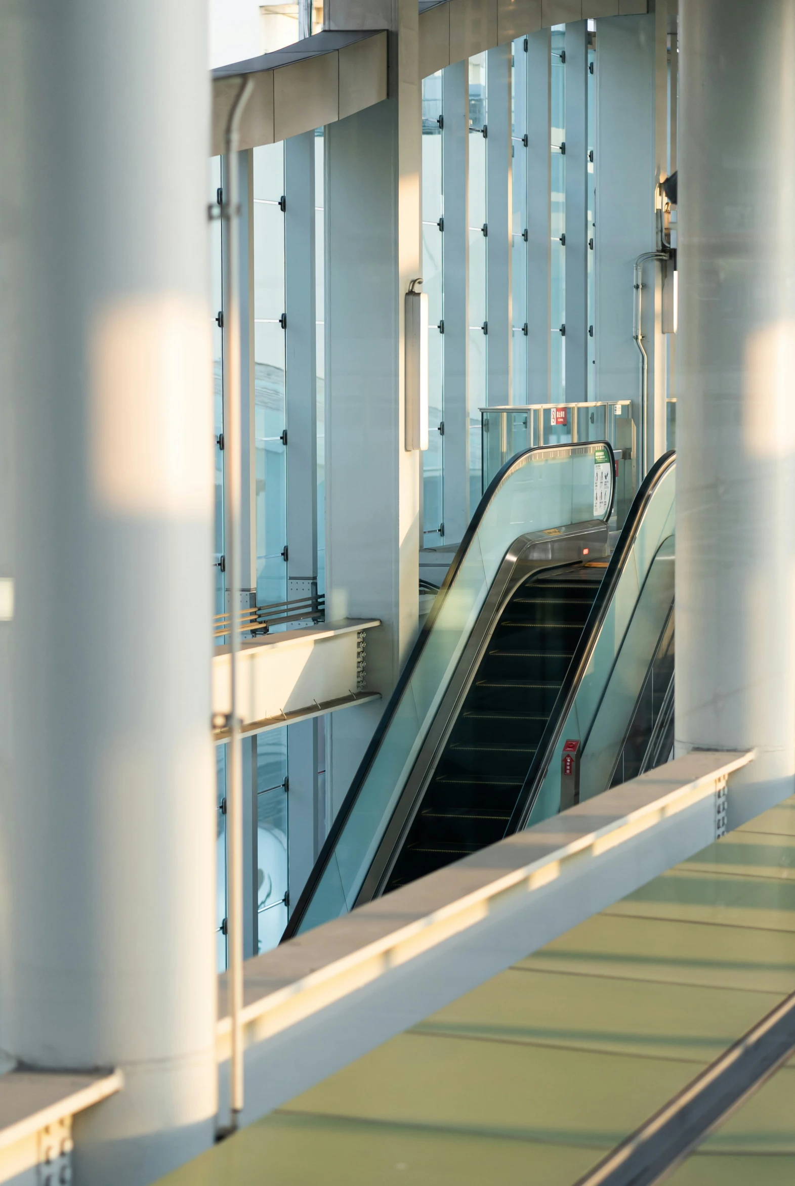 an escalator is seen in this image taken in a building