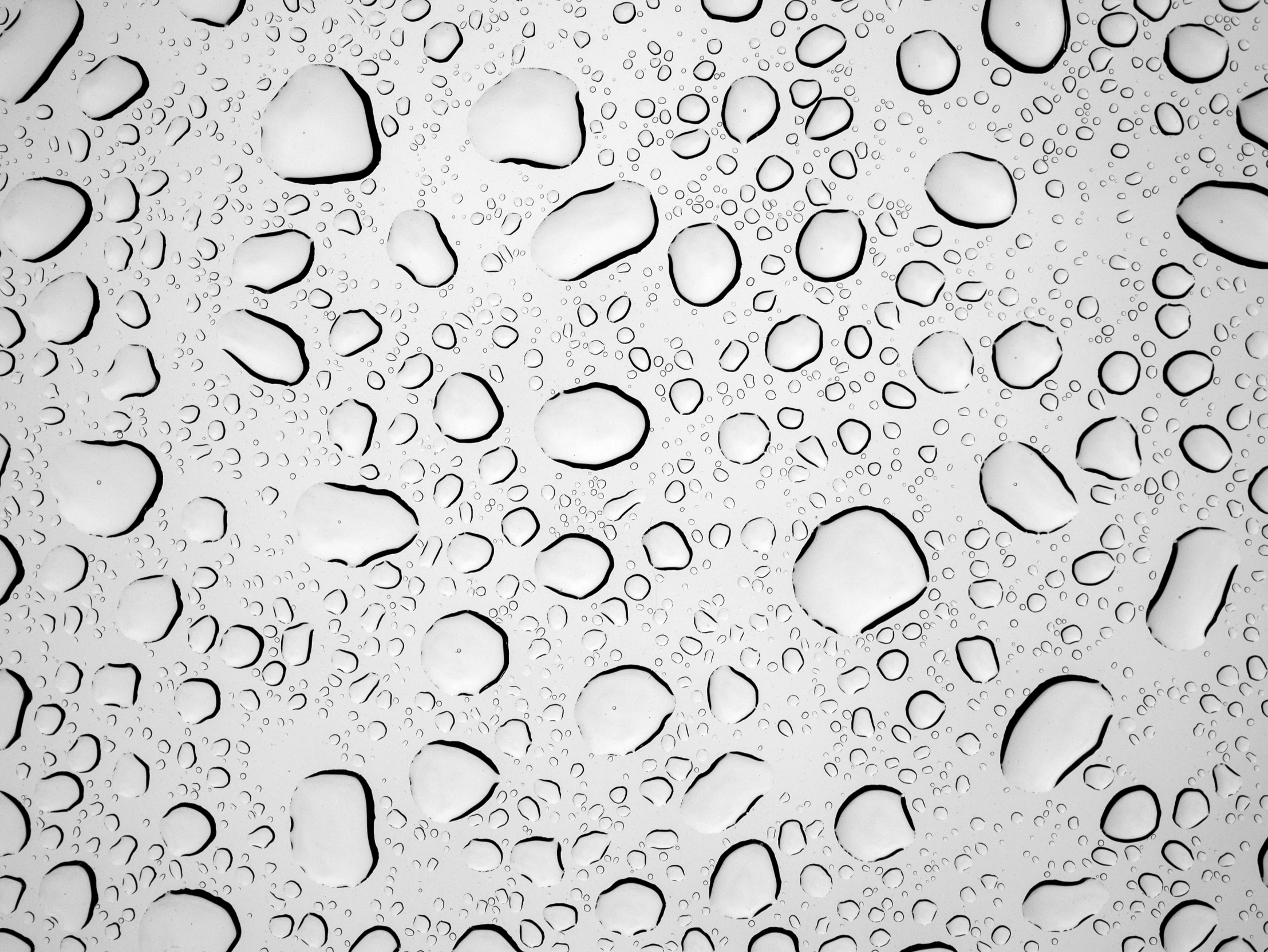 rain drops on a window during a rainy day