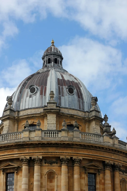 the top of the dome of the building has four windows