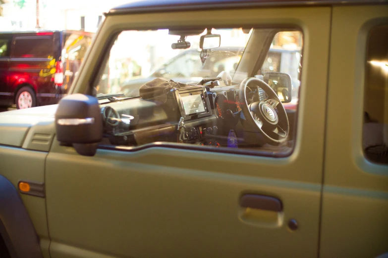 the reflection of cars in a vehicle window