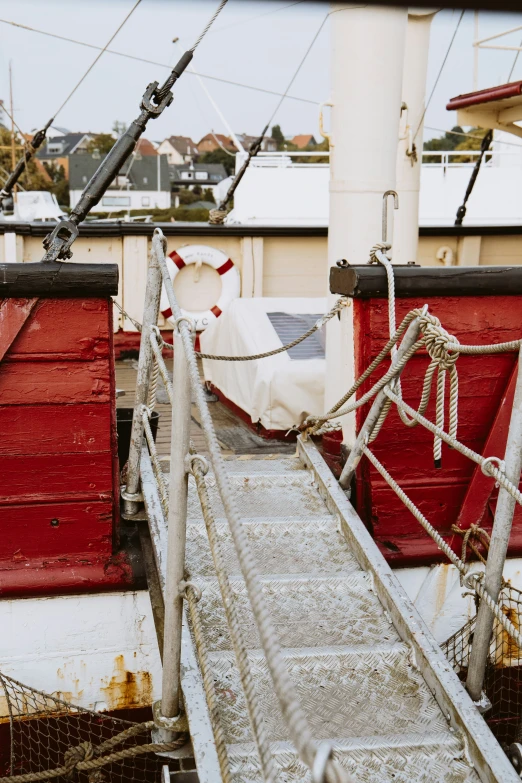 a set of stairs next to the side of a boat