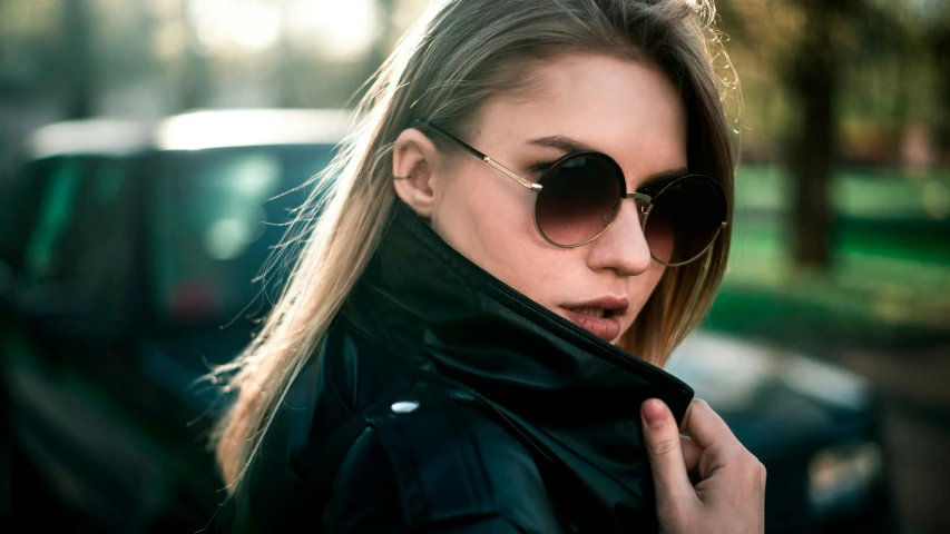 a close up of a person with sunglasses