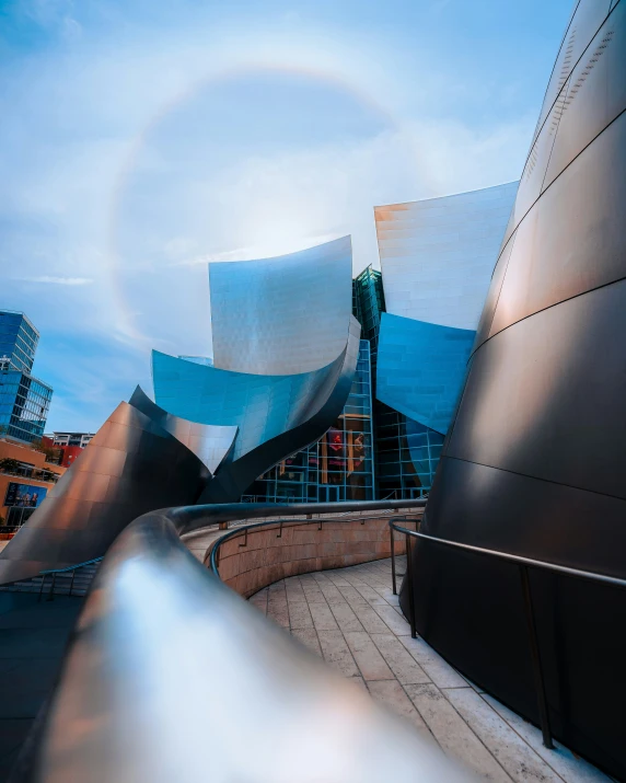 the view from the outside of a building with metal art