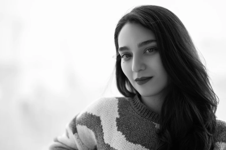 black and white po of woman with long hair