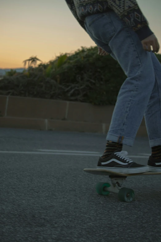 the foot of a person riding a skate board