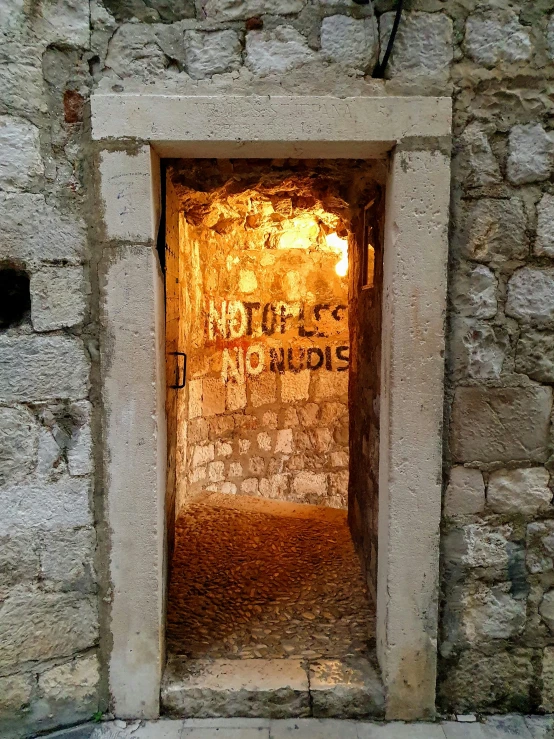 a door on the side of an ancient building