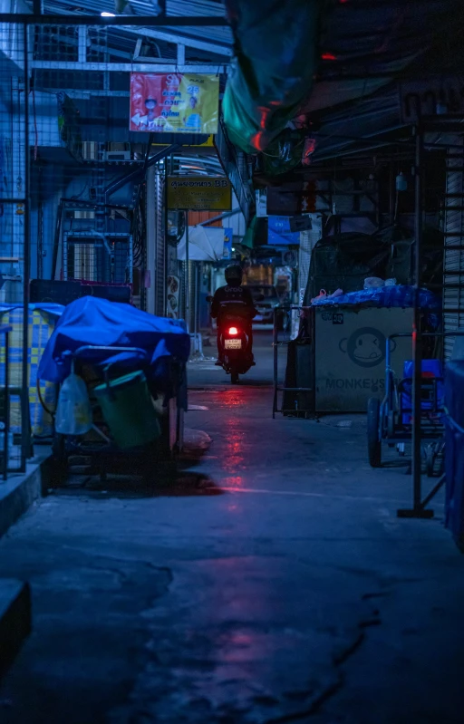 a bus is in the distance on a dark street