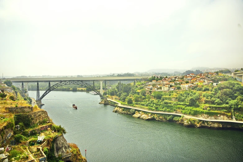 the river below a bridge is very peaceful