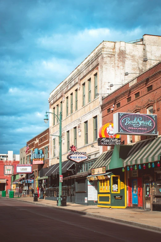 some shops on the side of a city street