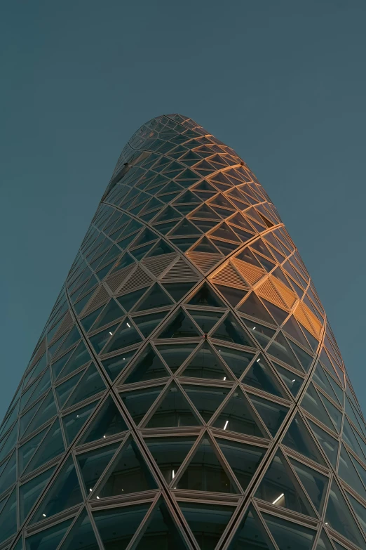 there are lights on the top of a large building