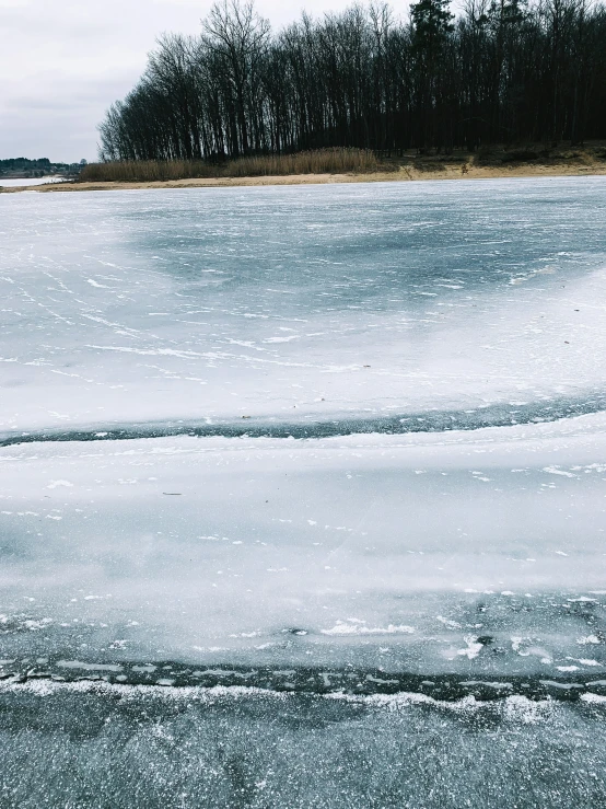 two vehicles on an empty and frozen surface