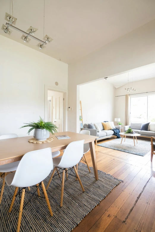 the living room is clean and bright and empty