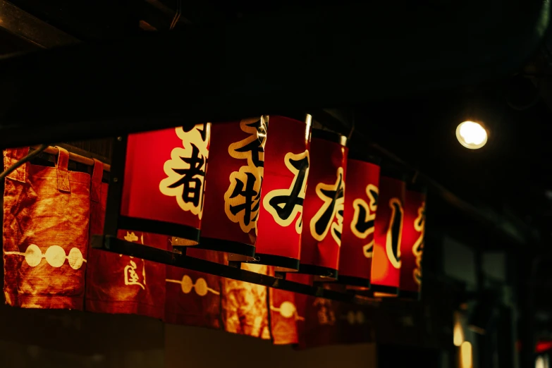 red packets are hung in rows in a restaurant