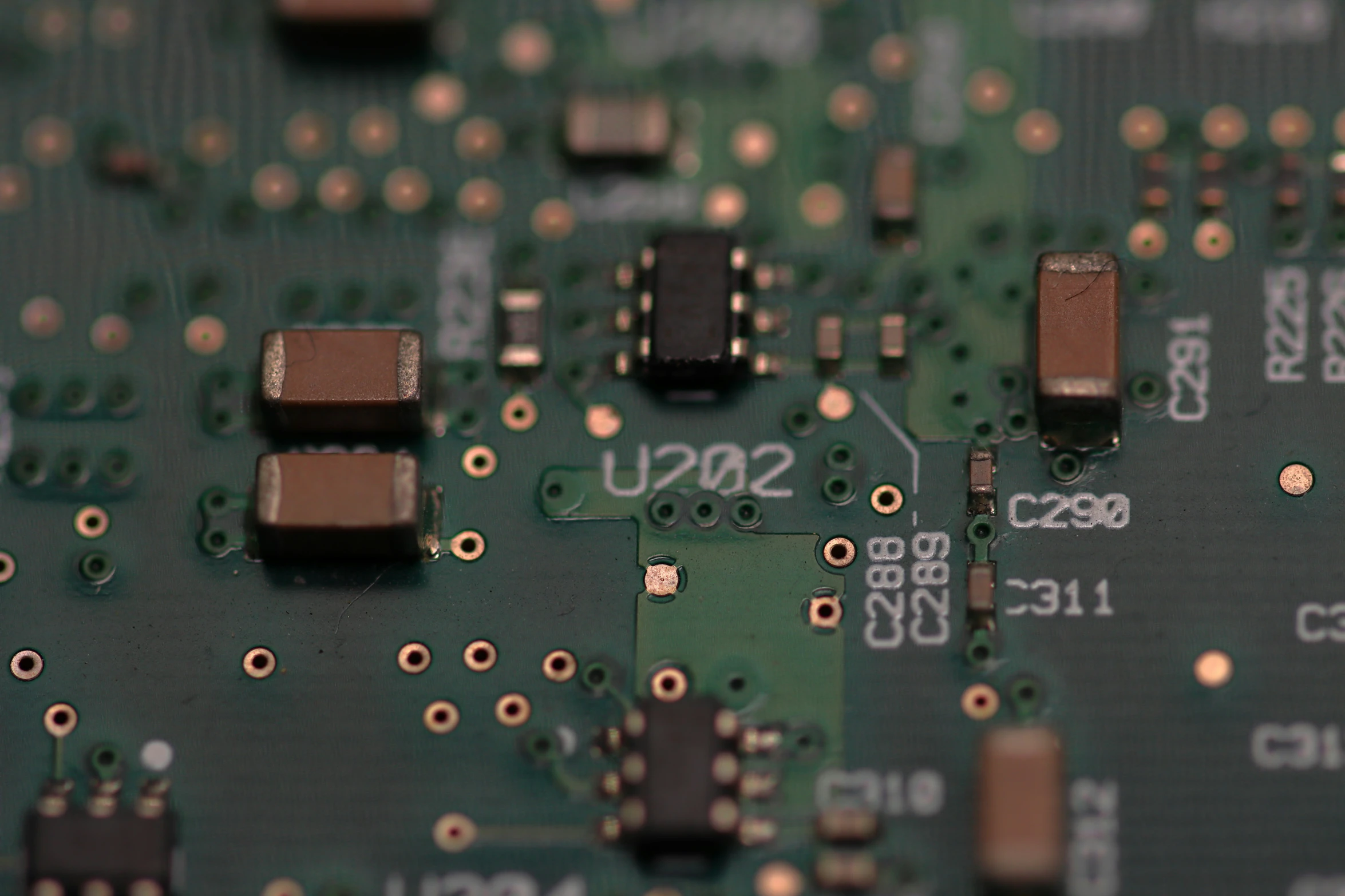 closeup of the electronic board with brown chip