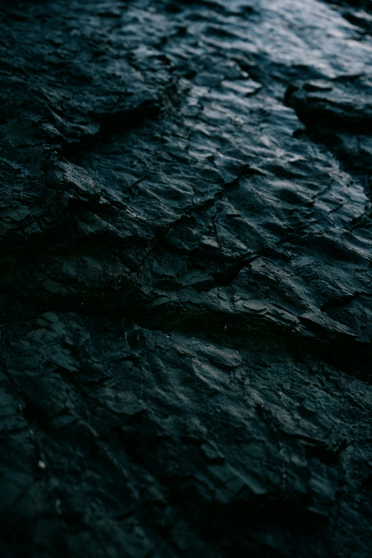 an object sitting on the wet pavement outside