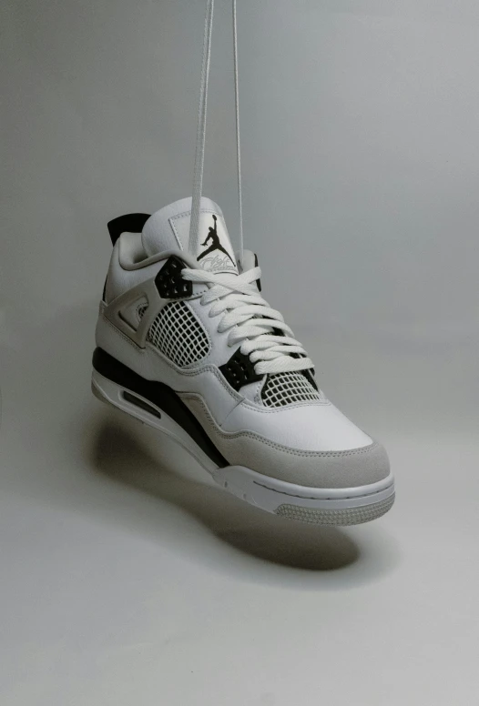 air jordans on string, with two strings connected to them