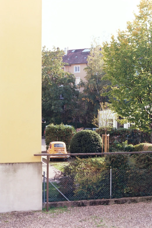 a vehicle is parked in the middle of a yard