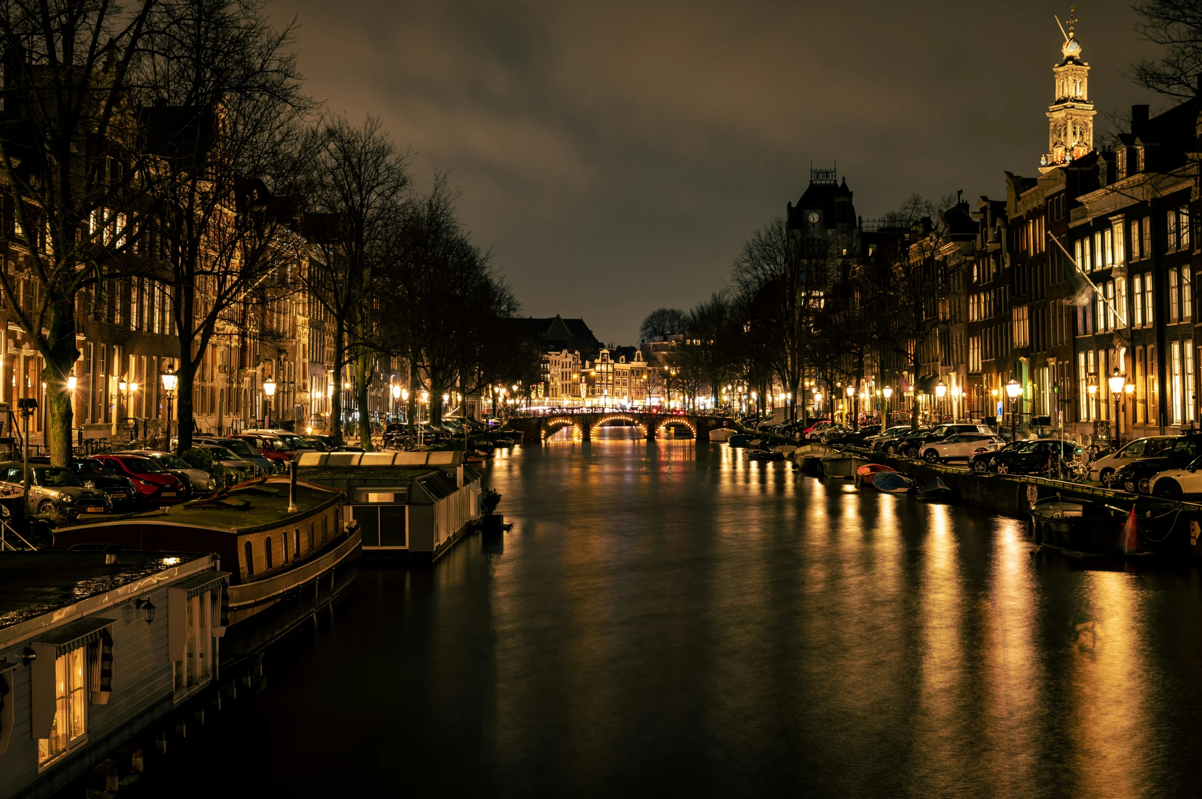 a river running through a city filled with lots of tall buildings