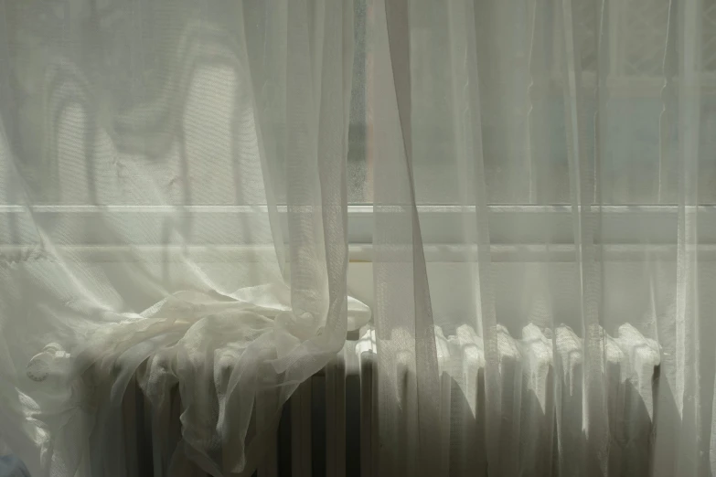 a view from a window at the inside of a curtain