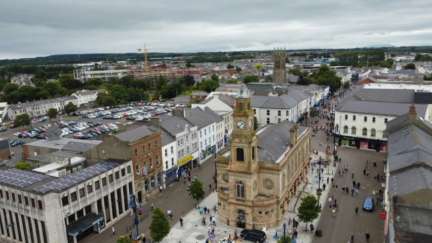 a aerial view shows the town and a church