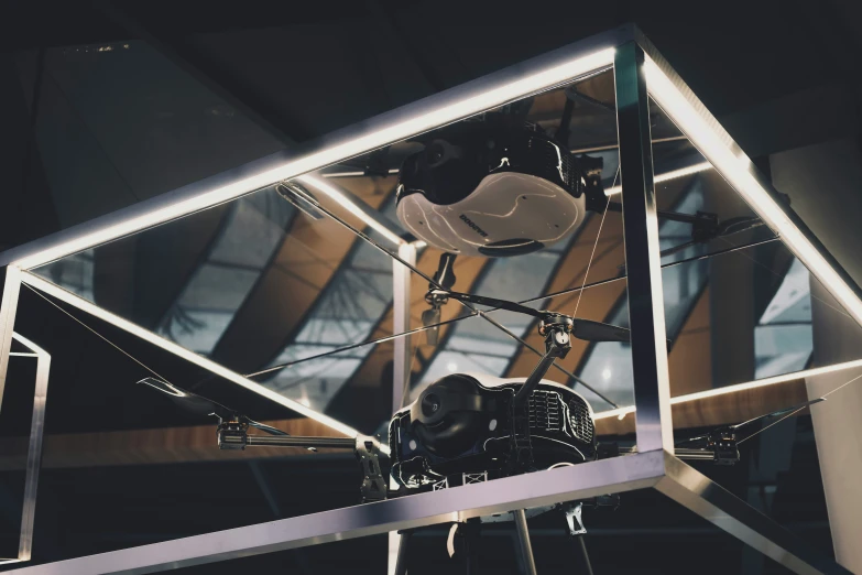 a black and white helicopter in the shape of a box