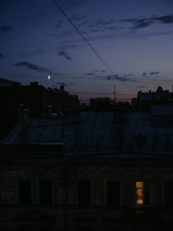 a city skyline seen from the roof of a building