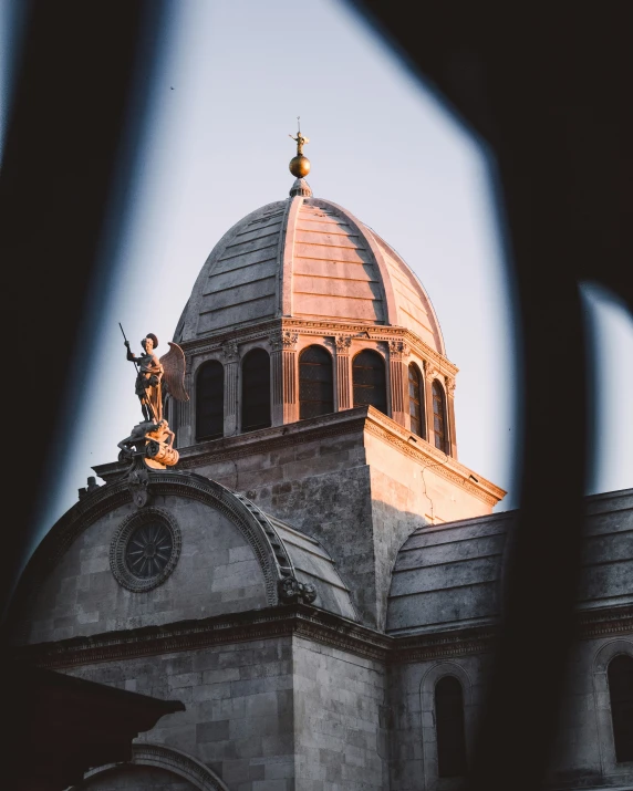 a building with a dome in the background