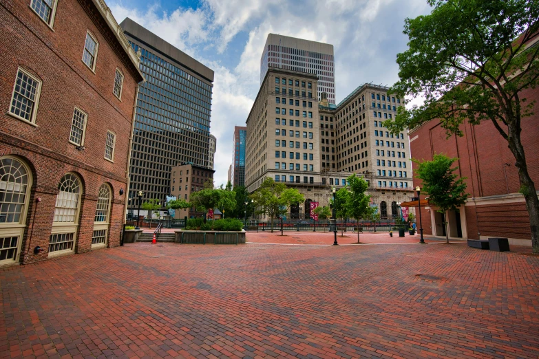 bricked square and tall buildings in the city