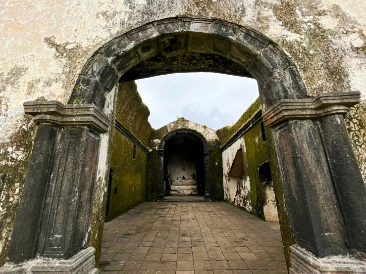 a tunnel in the concrete has a small entrance