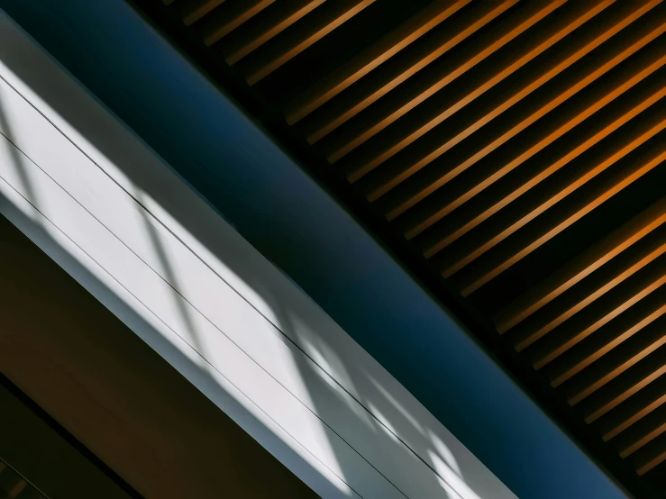 the shadows of the roof provide light to this building