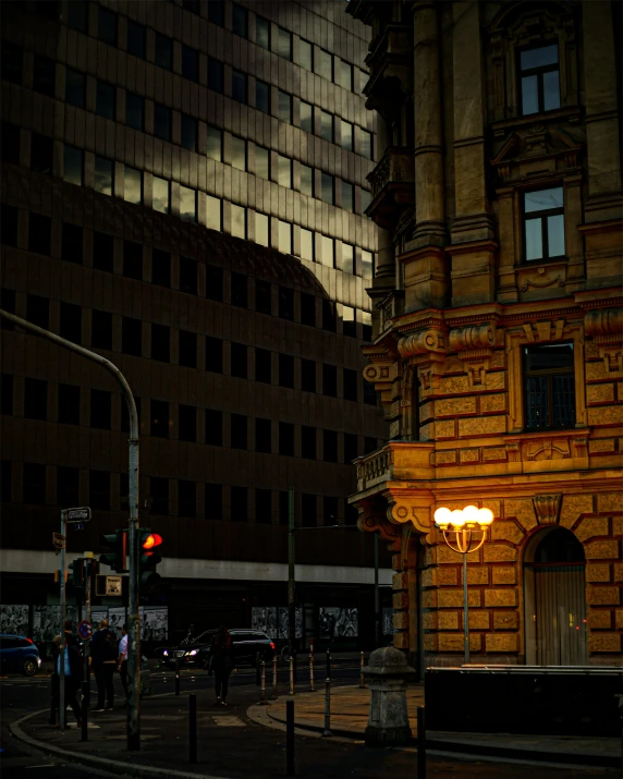 a street light in front of a large building