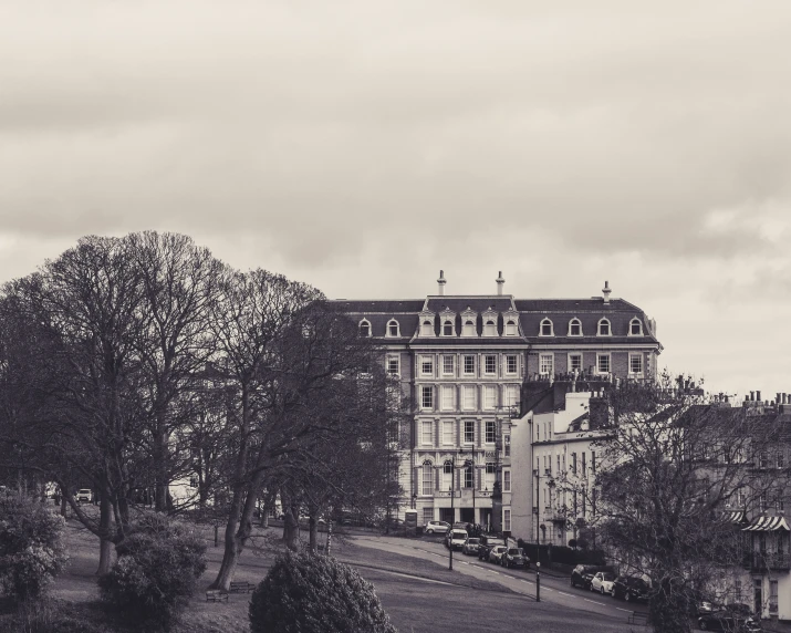 a black and white po of a building with a clock tower