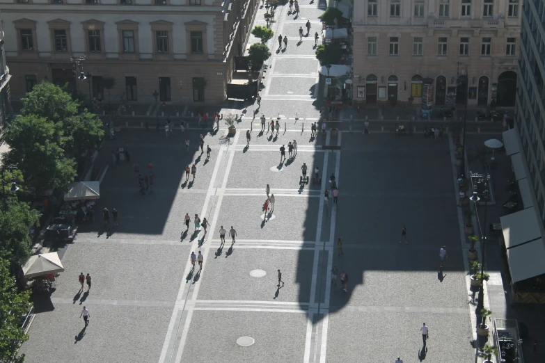 aerial view of people and vehicles in city street