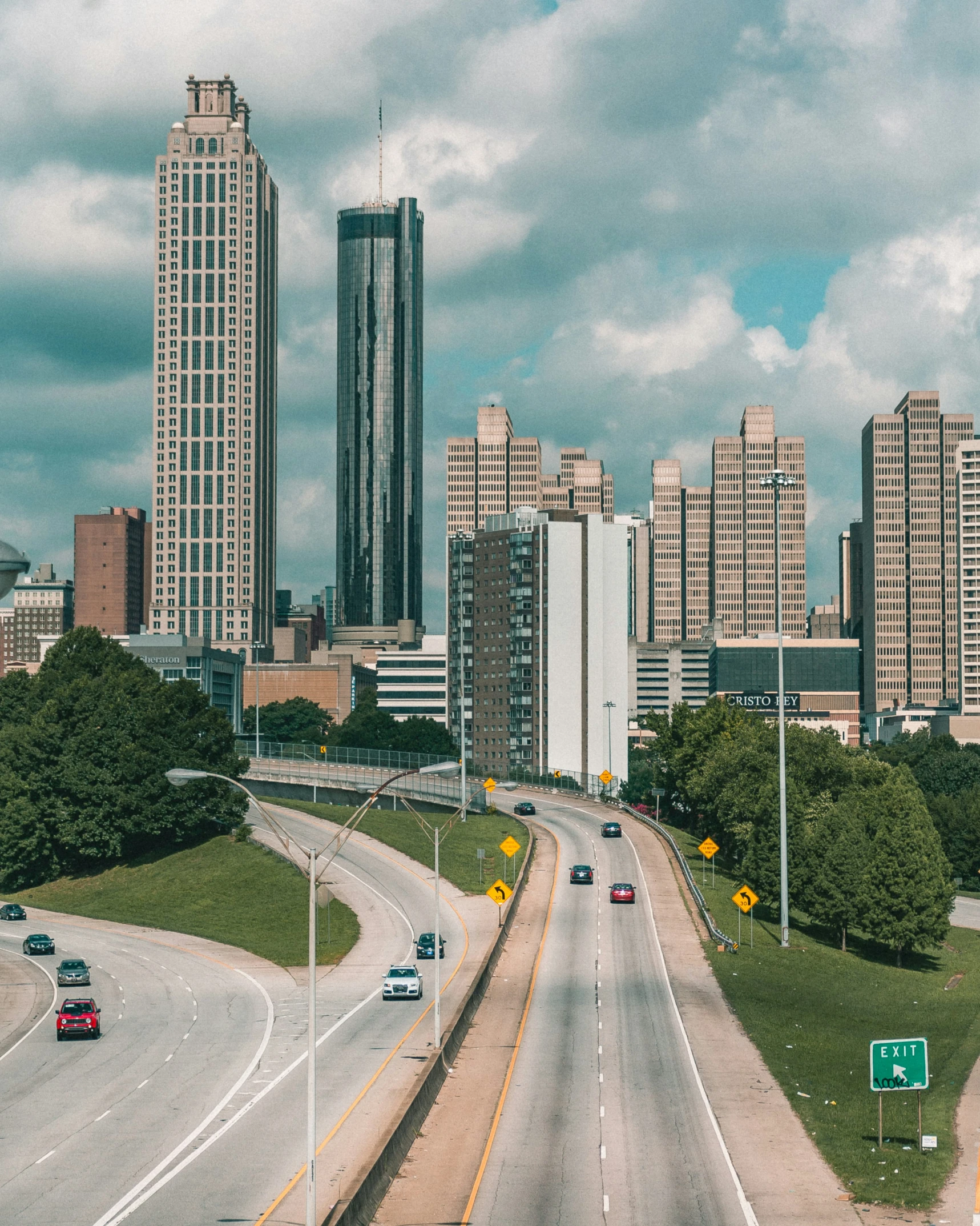 a city skyline and freeway highway with buildings