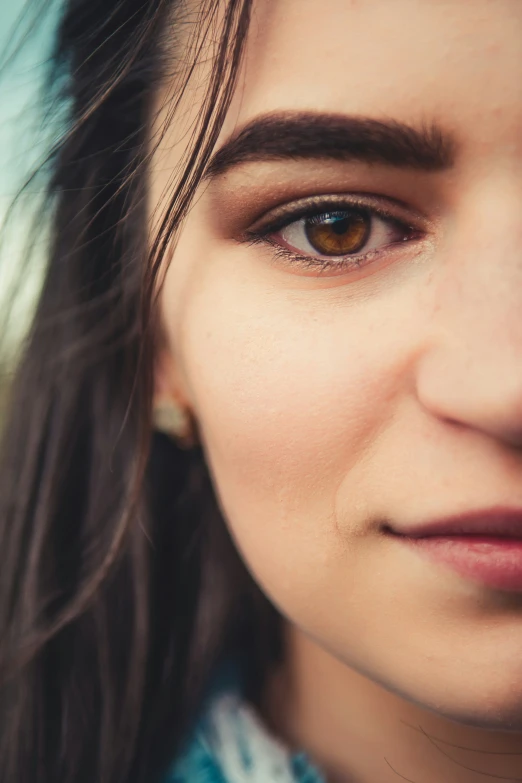 a closeup of a person with eyes closed