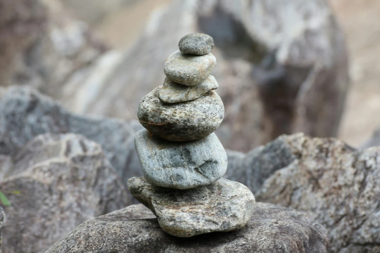 several gray rocks stacked on each other
